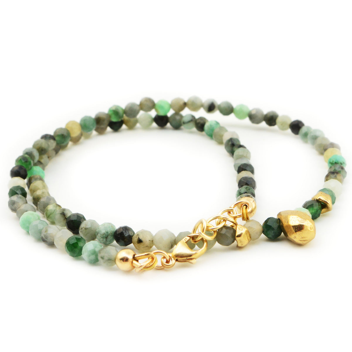 Close-up of Teardrop Emerald Necklace showcasing faceted green emerald beads, golden bronze accents, and gold-filled clasp