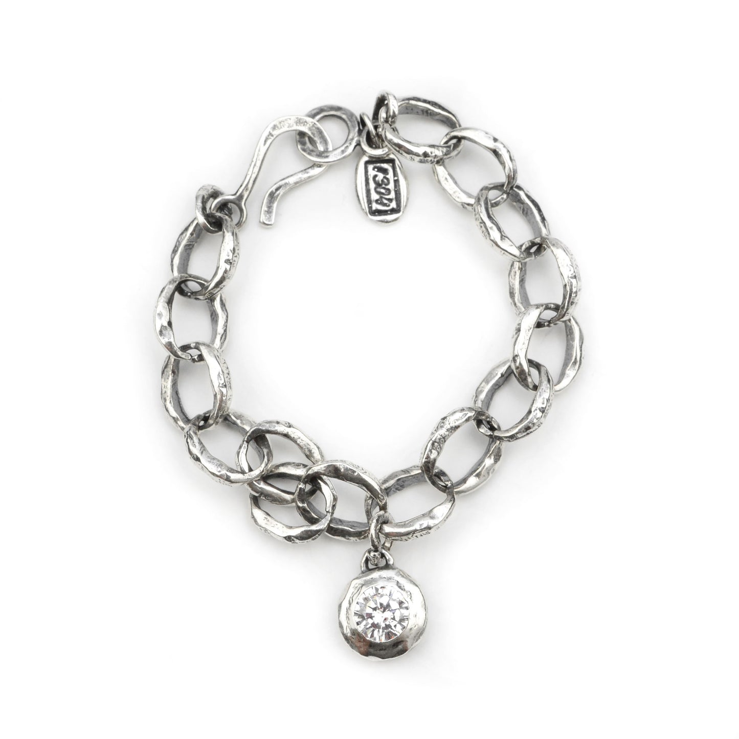 Front view of Carmel Silver Bracelet showing soldered sterling silver links, hook toggle, and moissanite on white background